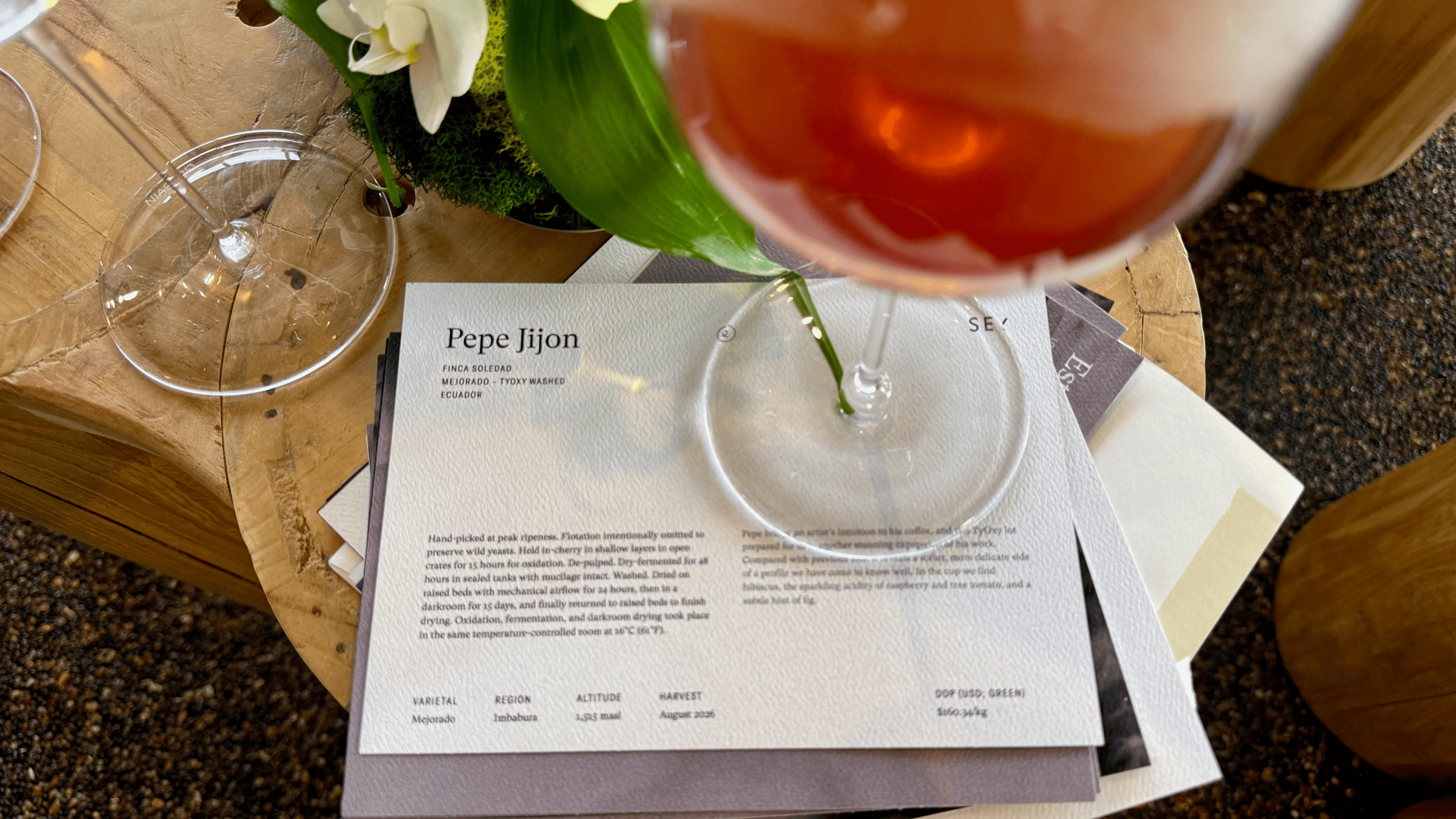 coffee in a wine glass on a paper titled "Pepe Jijon"