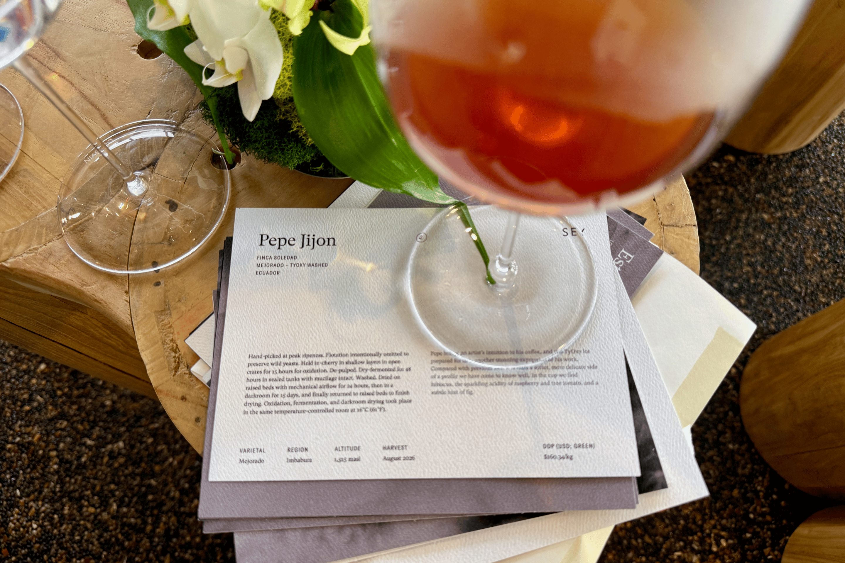 coffee in a wine glass on a paper titled "Pepe Jijon"