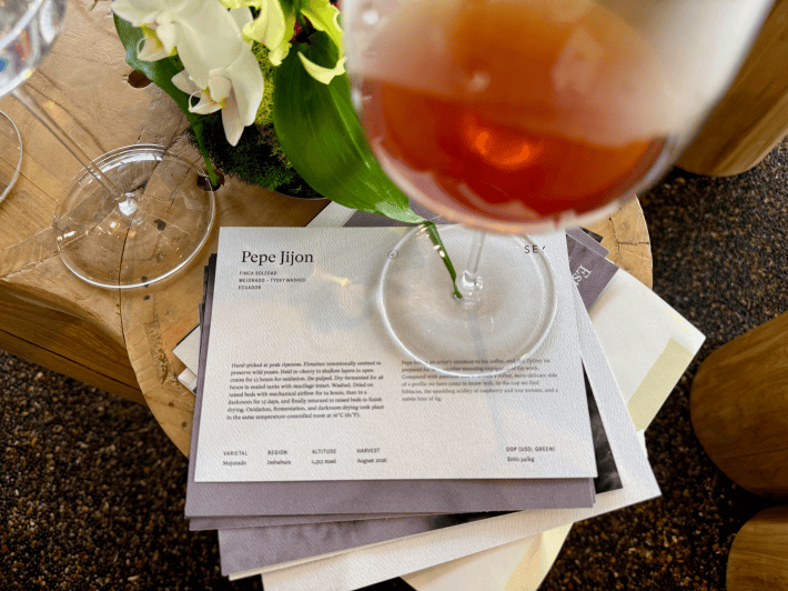 coffee in a wine glass on a paper titled "Pepe Jijon"