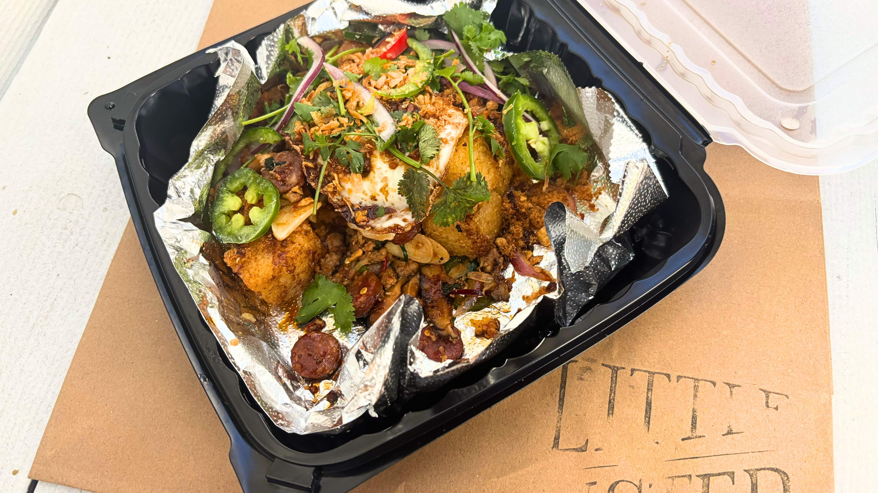 fried sticky rice with meat and toppings