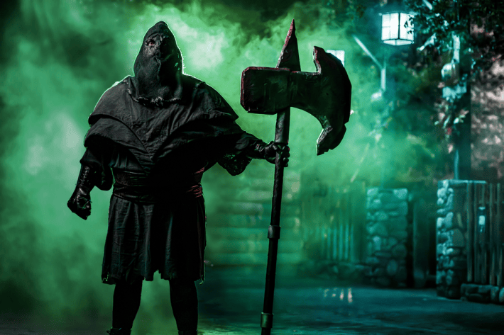 a grim reaper in a haunted maze