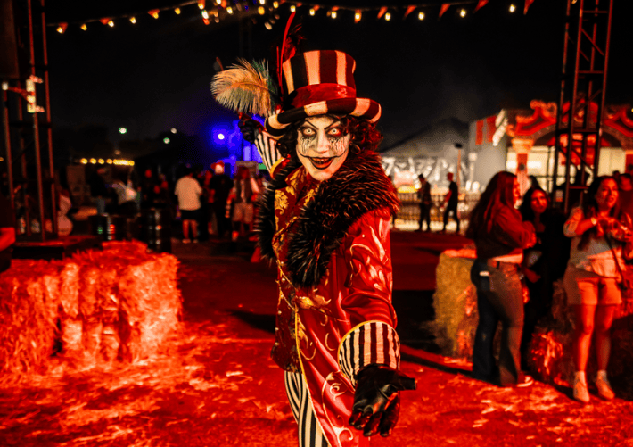 a scareactor dressed as a scary ringleader