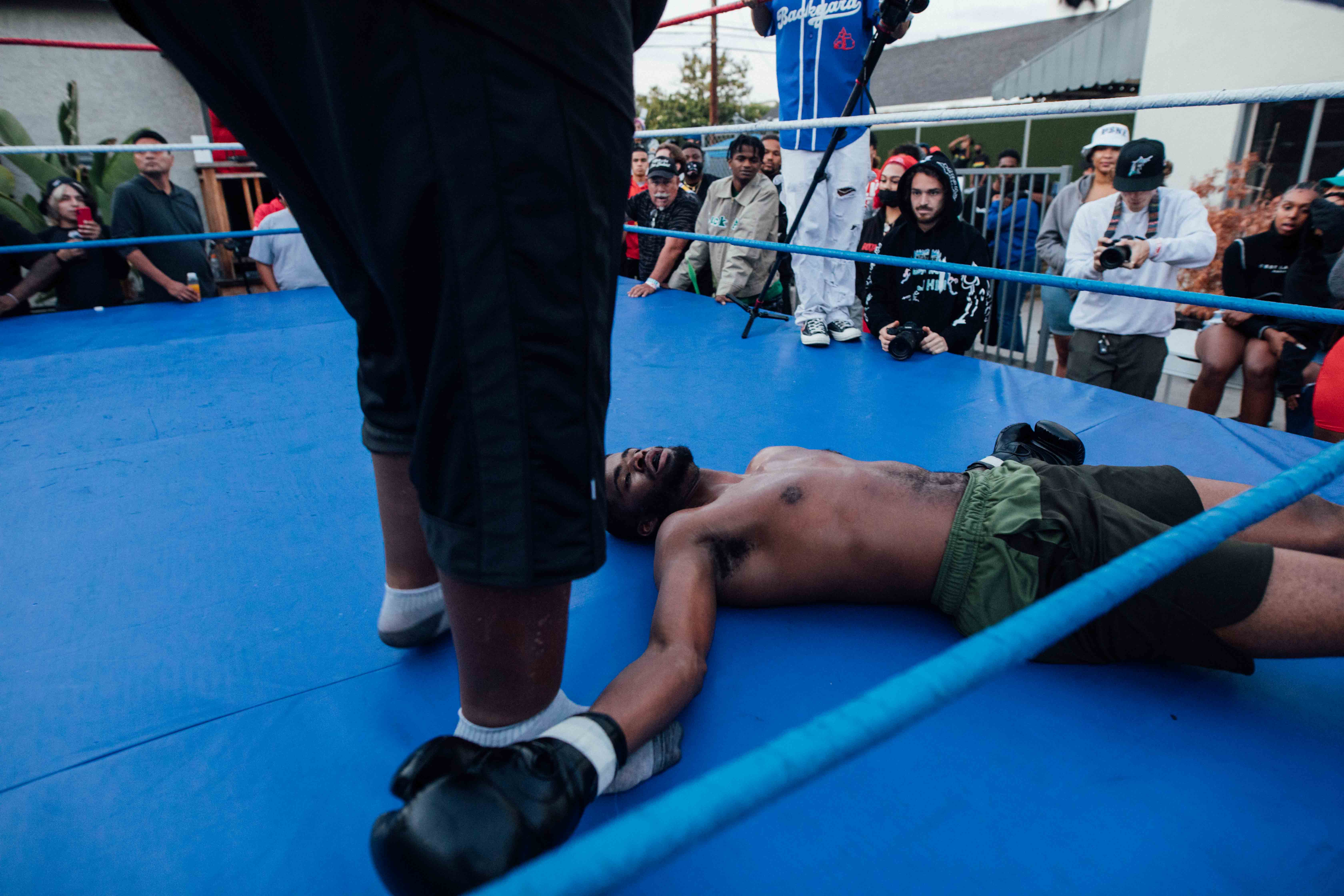 A fighter is knocked out during a match.