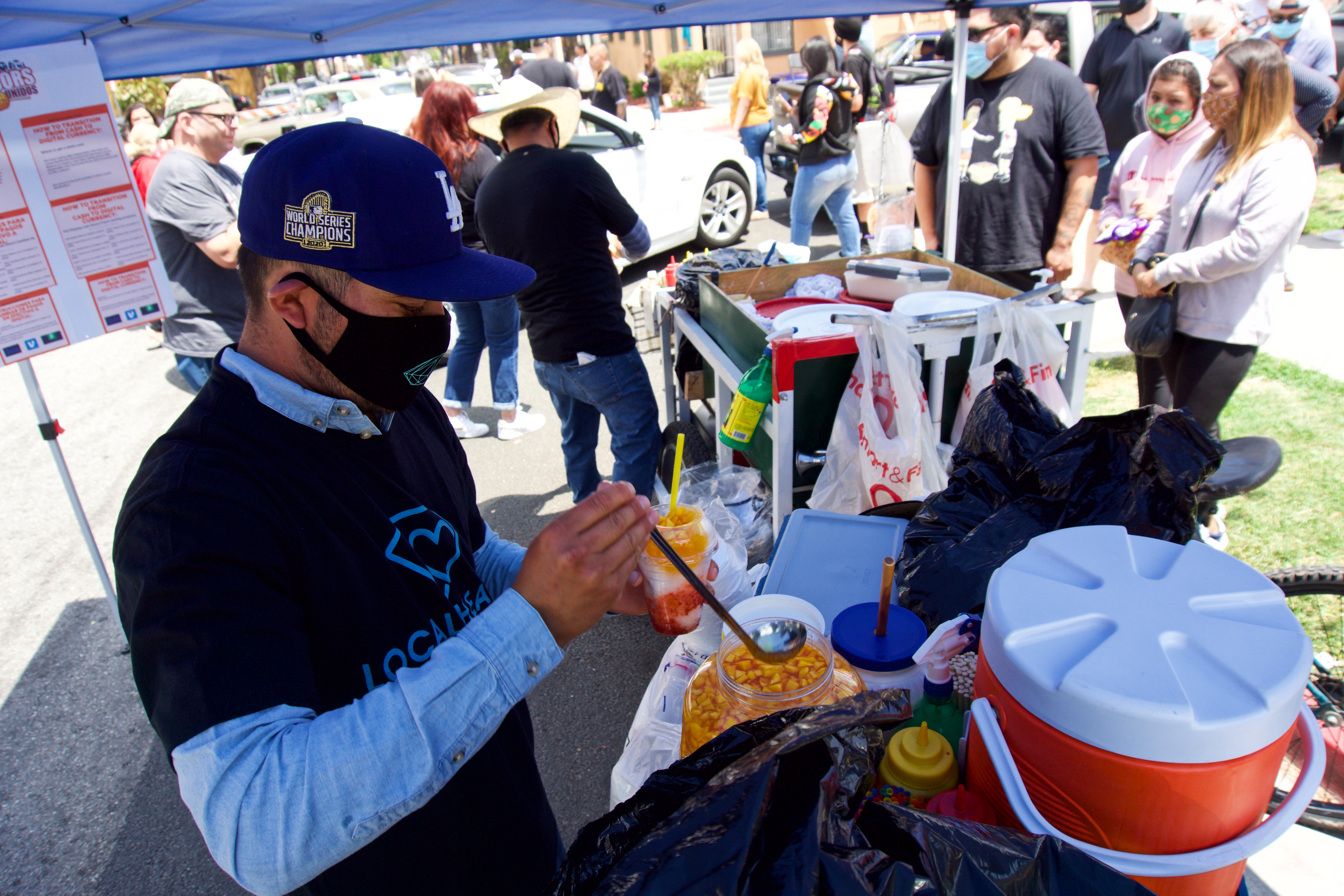 José Eugenio Vivanco serves his famous raspados to the community of Long Beach who came out to support two vendors after they were harassed earlier in the week.
