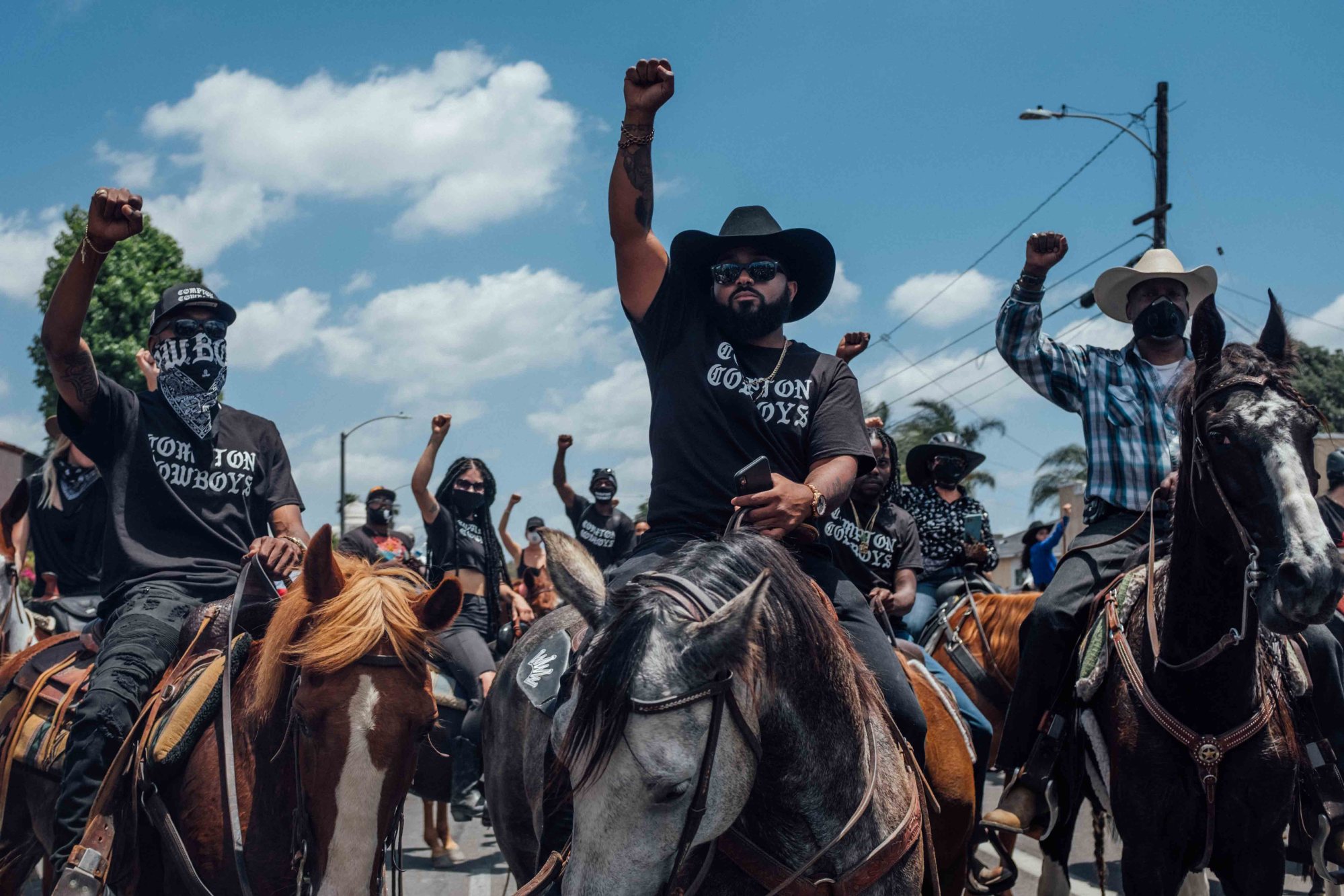 Black Cowboys Matter': Horseback protesters who grew up with George Floyd  lead the line in Houston