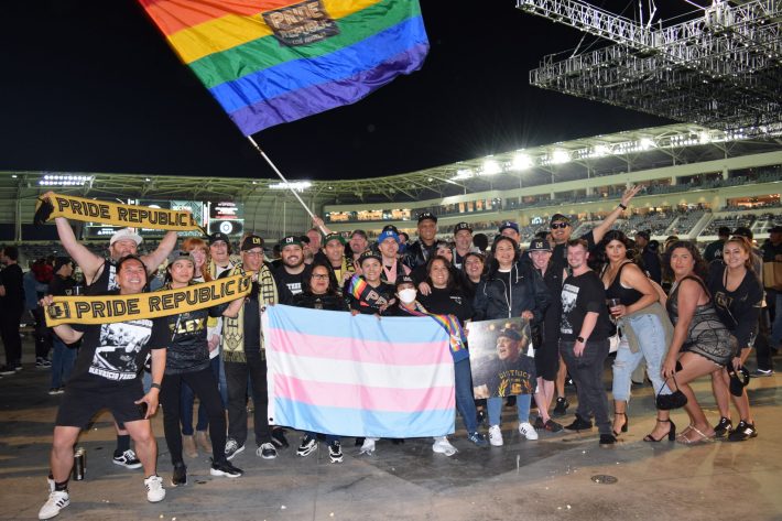 LAFC's Pride Group pose for a group photo. Photo by Rob Jalón/ @elescuderodela for L.A. TACO.