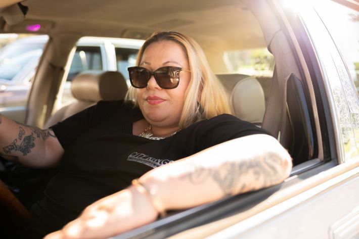 Women driving their lowriders.