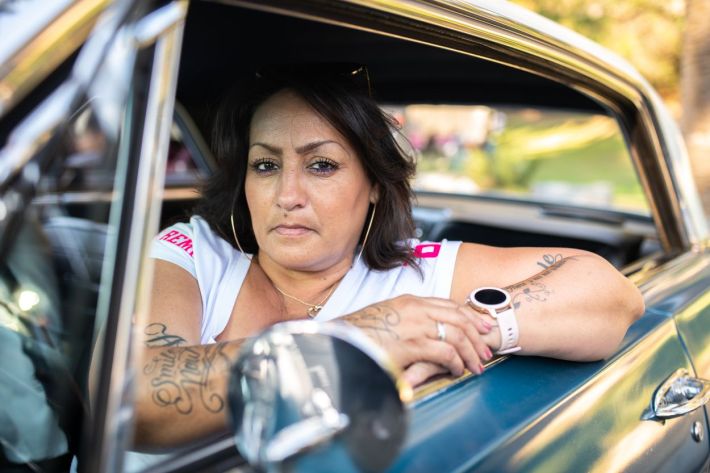 Women driving their lowriders.