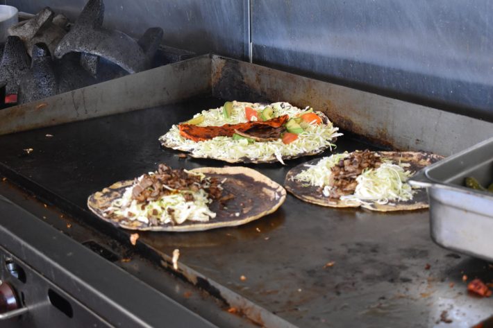 A tlayuda being prepared at El Chapulín. Photo by Guadalupe Perez