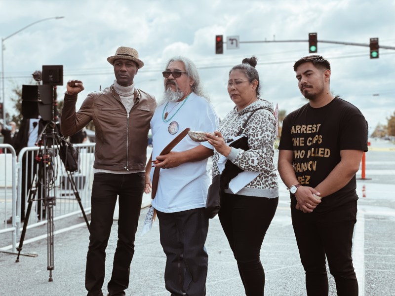 Artist Aloe Blacc performed in Santa Ana at the Roses From the Concrete event in honor of Brandon Lopez the man who was killed by police while suffering a mental health crisis. Blacc met and spoke with Lopez's father (pictured next to him) and gave his condolences to the family.