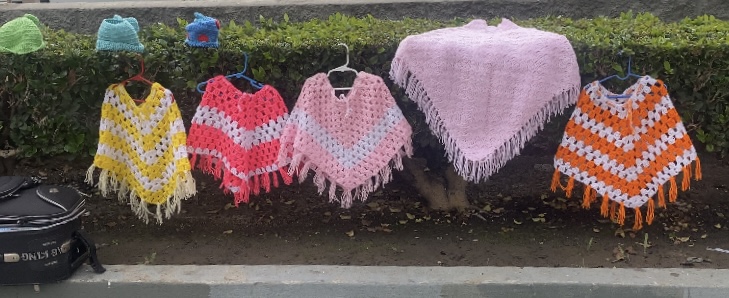 Maria’s knitted tops. Photo by Nancy Cruz.