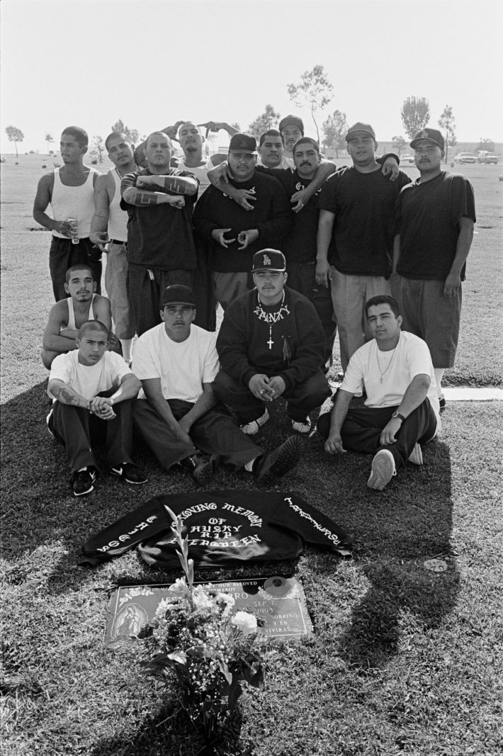 Evergreen Gang members visit one of the fallen. East Los Angeles, CA, 1993