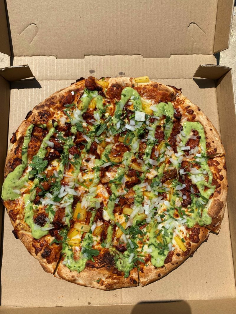 Pizza from L.A. Birria Pizza. Photo by Memo Torres.