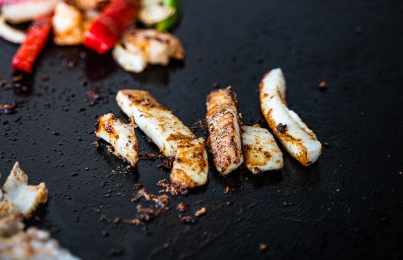 The grilled calamari strips behind our taco of the week. Photo by Memo Torres for L.A. TACO.