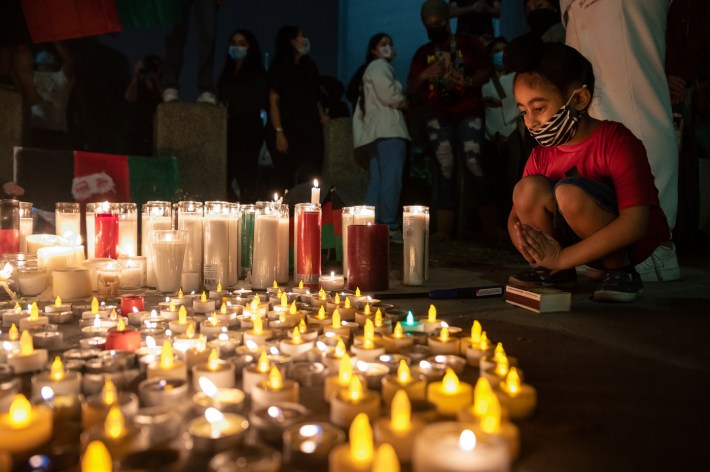 The Afghani American community gathering at vigil held in West Los Angeles.