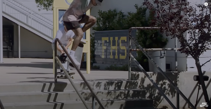 Nyjah Huston attempts to collie onto an 18 stair rail at Franklin Highschool.