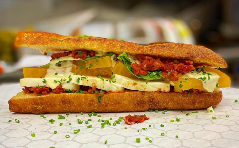 The Roasted Golden Beet and Fresh Mozzarella Baguette Sandwich with Garlic Aioli, Basil, and Tomato Relis