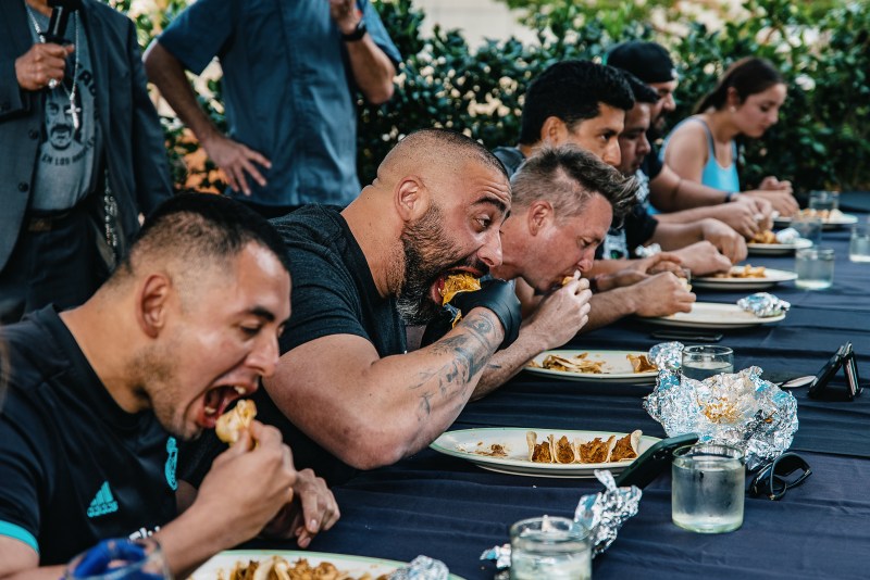 Pez Cantina's and Trejos Tacos' taco eating competition in full swing