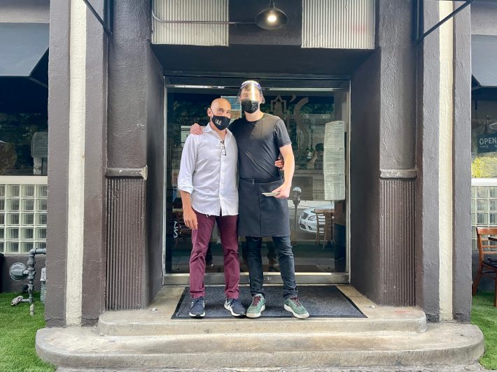 Horacio Weschler and his son Maximiliano Weschler, who works as a busboy, in front of the Lala’s in Melrose.