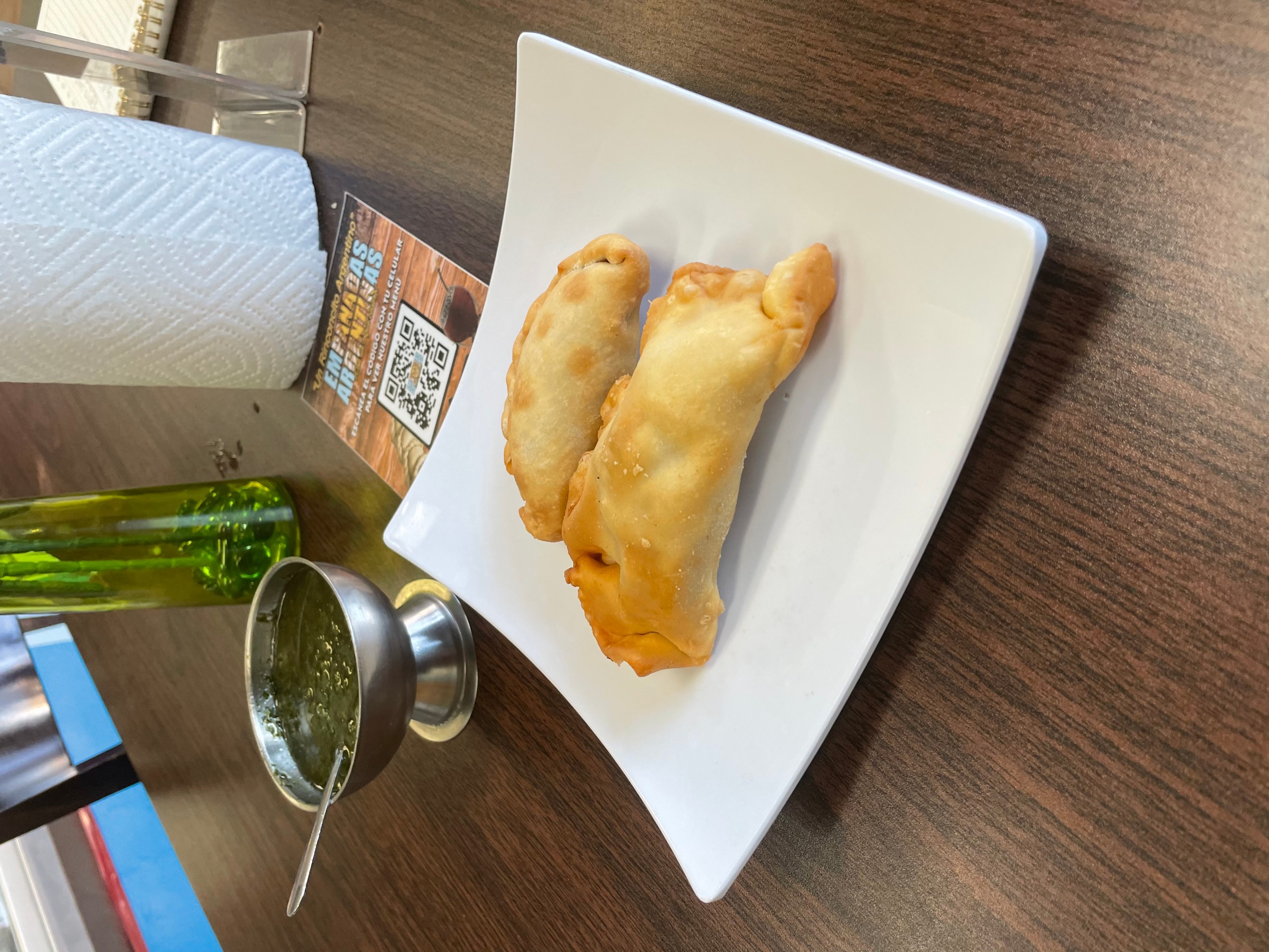 Un Rinconcito Argentino’s empanadas de pollo and dulce de leche and chimichurri.