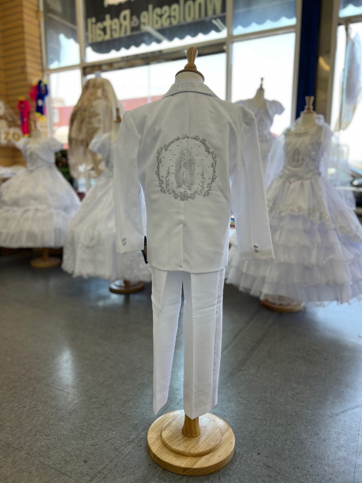 A Virgin Mary-adorned custom suit for a first communion.