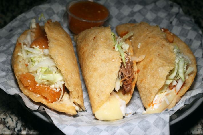 An order of three quesadillas at La Cosa Nuestra.