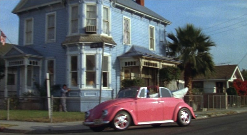 Rudy drives his pink, 1968 VW Beetle during the opening credits. Photo via Universal Pictures.
