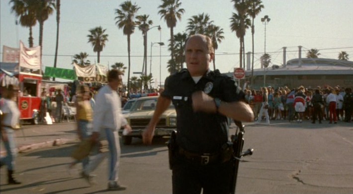 Hodges (Robert Duvall) runs after High Top. Screenshot via Orion Pictures.