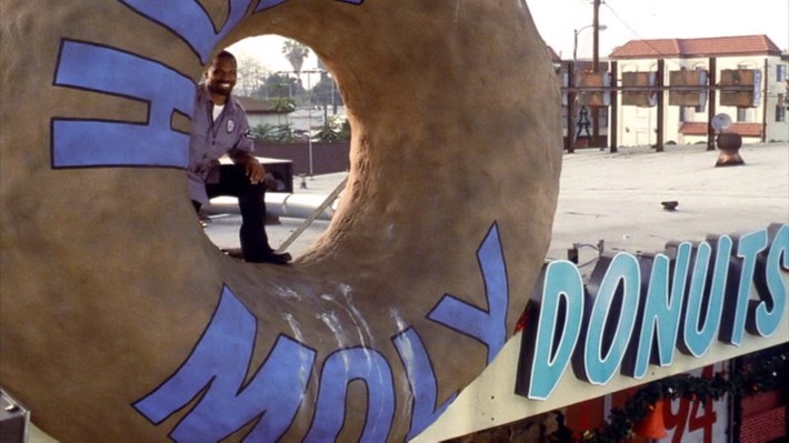 Day-Day hides inside the giant Holy Moly donut. Photo via New Line Cinema.