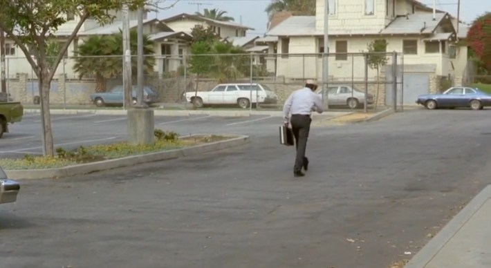 Mr. Escalante walks home from school after he believes his car has been stolen. Photo via Warner Bros. Pictures.