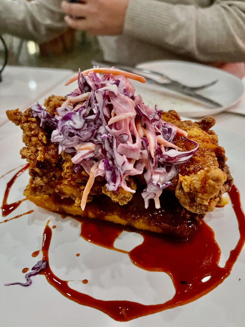 Mexican hot chicken on cornbread at El Barrio Cantina. Photo by Javier Cabral for L.A. TACO.