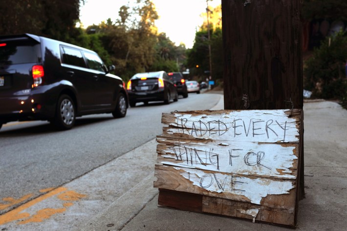 traded everything for love sign on laurel canyon